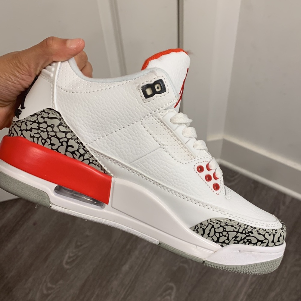 Red and white Jordan 3’s